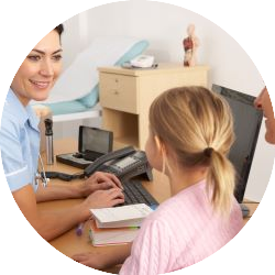 nurse-talking-to-child-and-mother